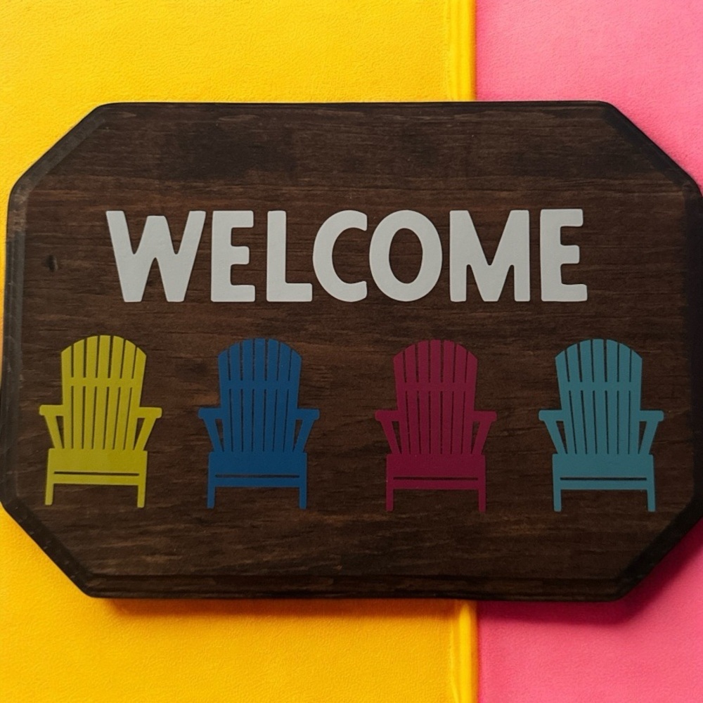 Colorful Welcome Sign with Adirondack Chairs
